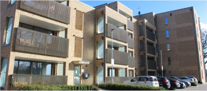 The entrance and car park to La Riviere apartments