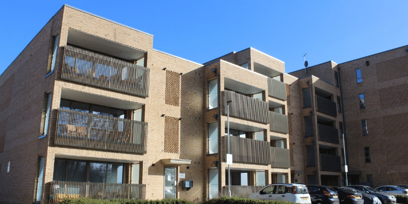 Image entitled La Riviere Building And Car Park